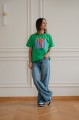 zielona koszulka z nadrukiem stylizacja codzienna