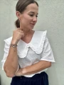 Elegancka biała koszula damska do jeansów i spódnicy
